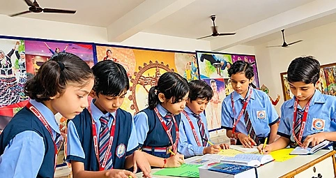 Students learning in a smart classroom at SRS Global School, Meerut
